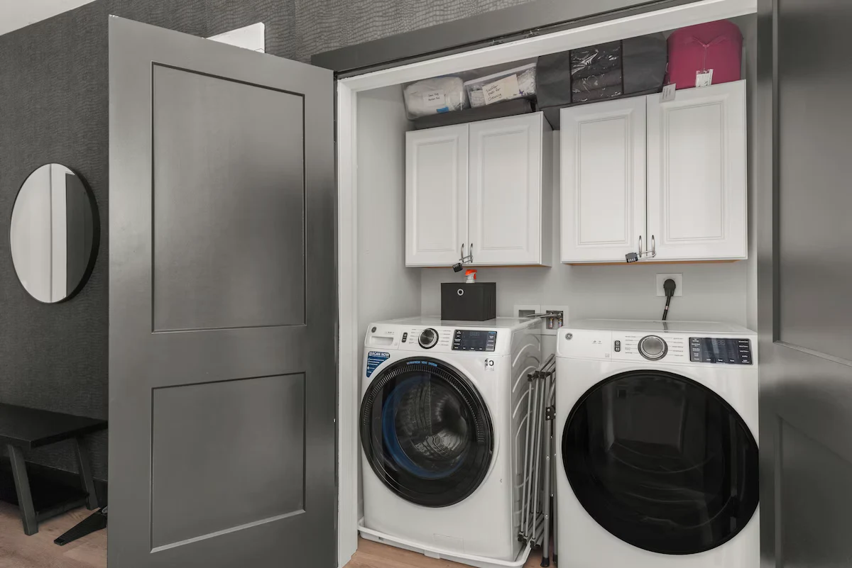 Private Laundry area with washer and dryer